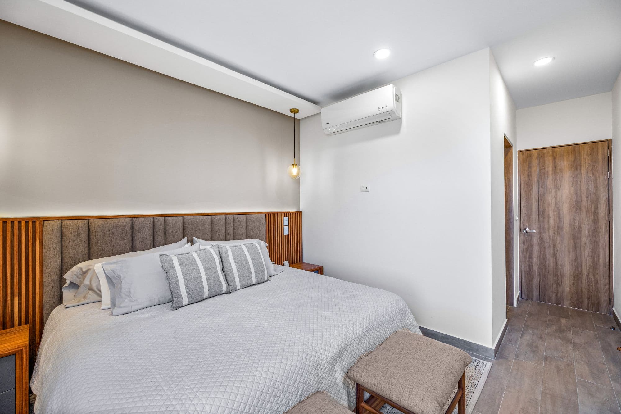 Barrio Santo 9C — Barrio Santo, San Miguel de Allende — photo 13 — contemporary bedroom with elegant wood detailing