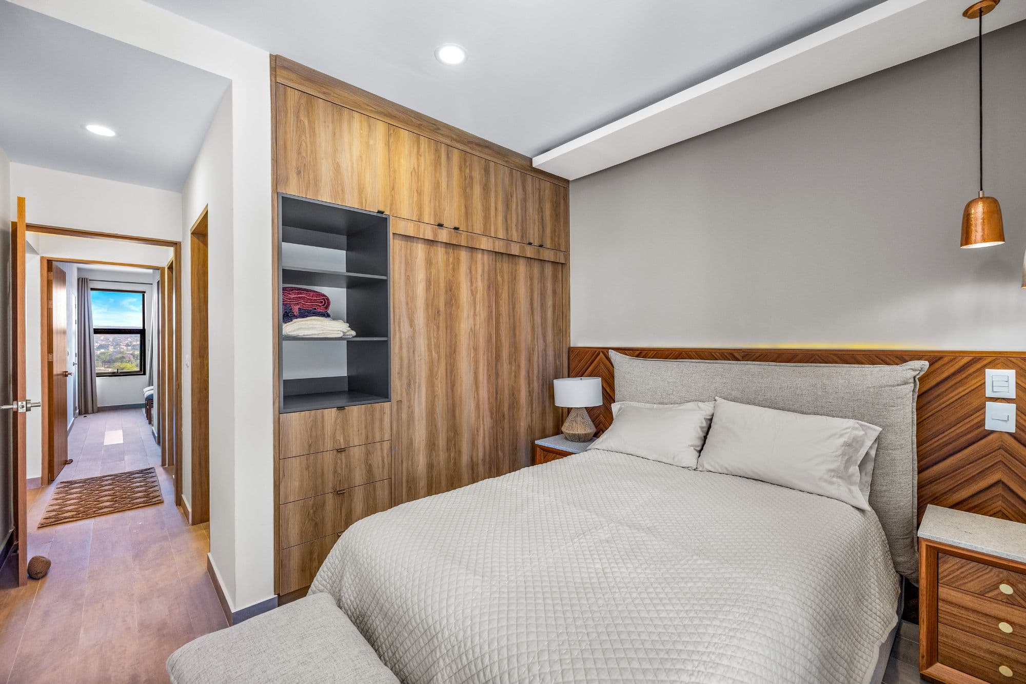 Barrio Santo 9C — Barrio Santo, San Miguel de Allende — photo 10 — contemporary master suite, warm wood elegance