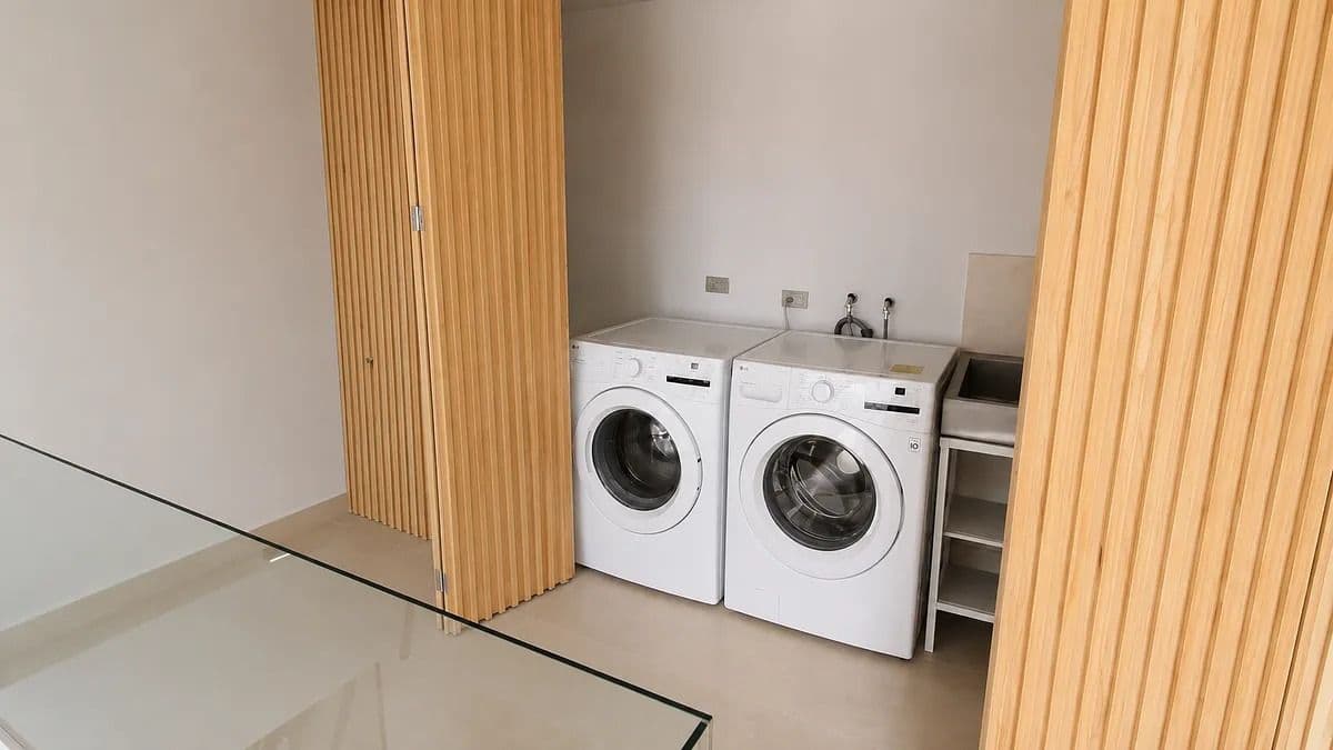 Casa Ventanas — Club de Golf Ventanas, San Miguel de Allende — photo 35 — modern laundry sanctuary with natural light