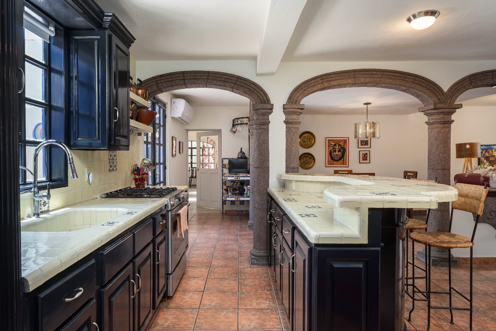 Casa Morada — San Antonio, San Miguel de Allende — photo 3 — elegant stone arches, timeless mexican kitchen