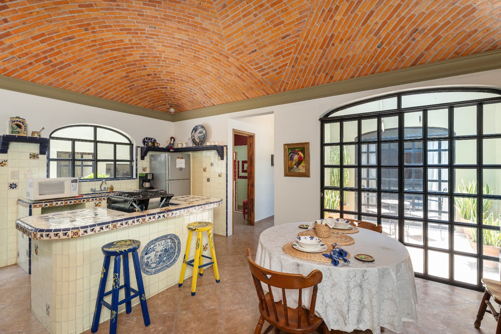 Casa Morada — San Antonio, San Miguel de Allende — photo 15 — charming colonial kitchen with soaring brick ceiling