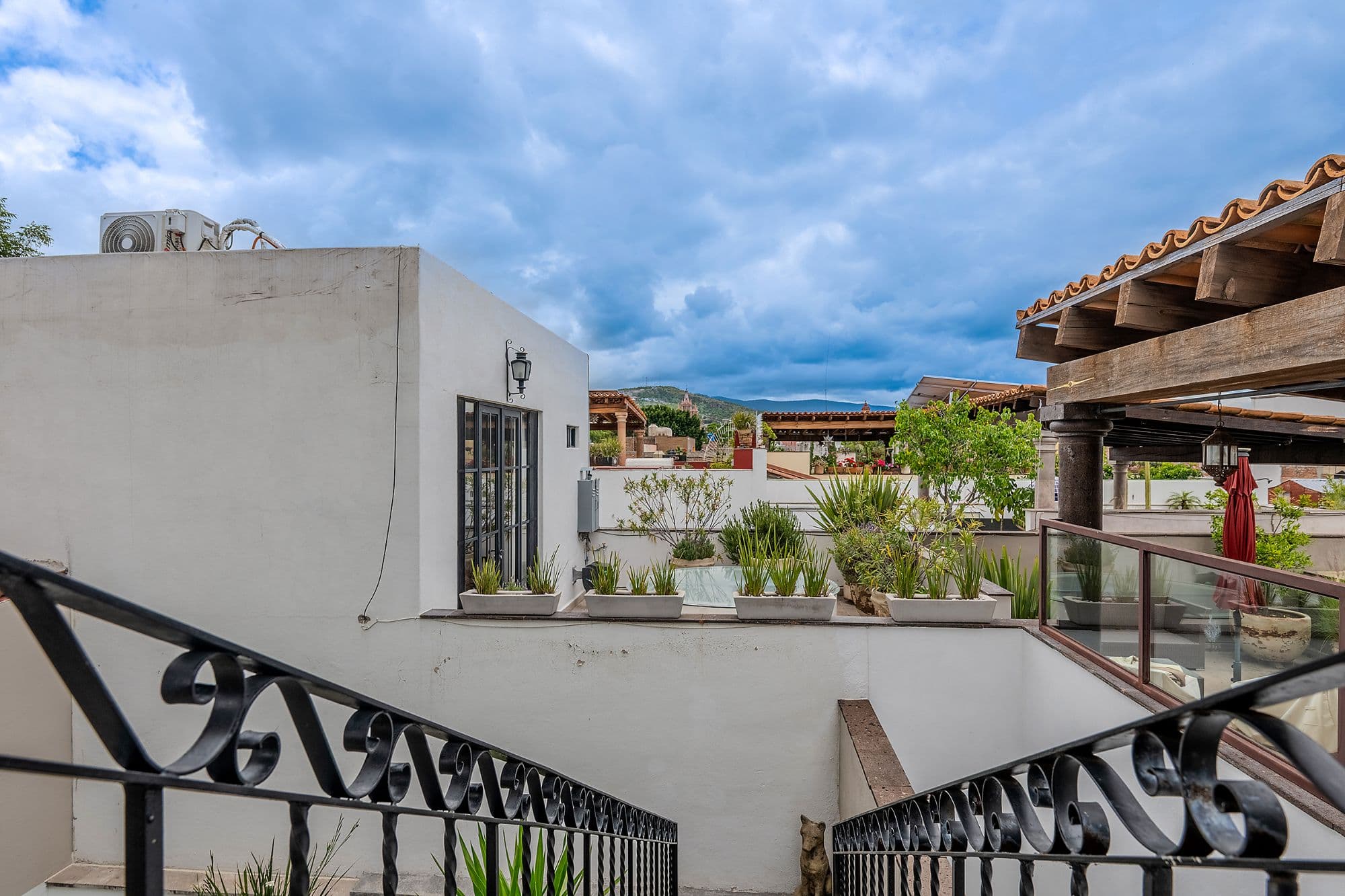 Casa de los Leones — Guadalupe, San Miguel de Allende — photo 23 — rooftop terrace with mountain views