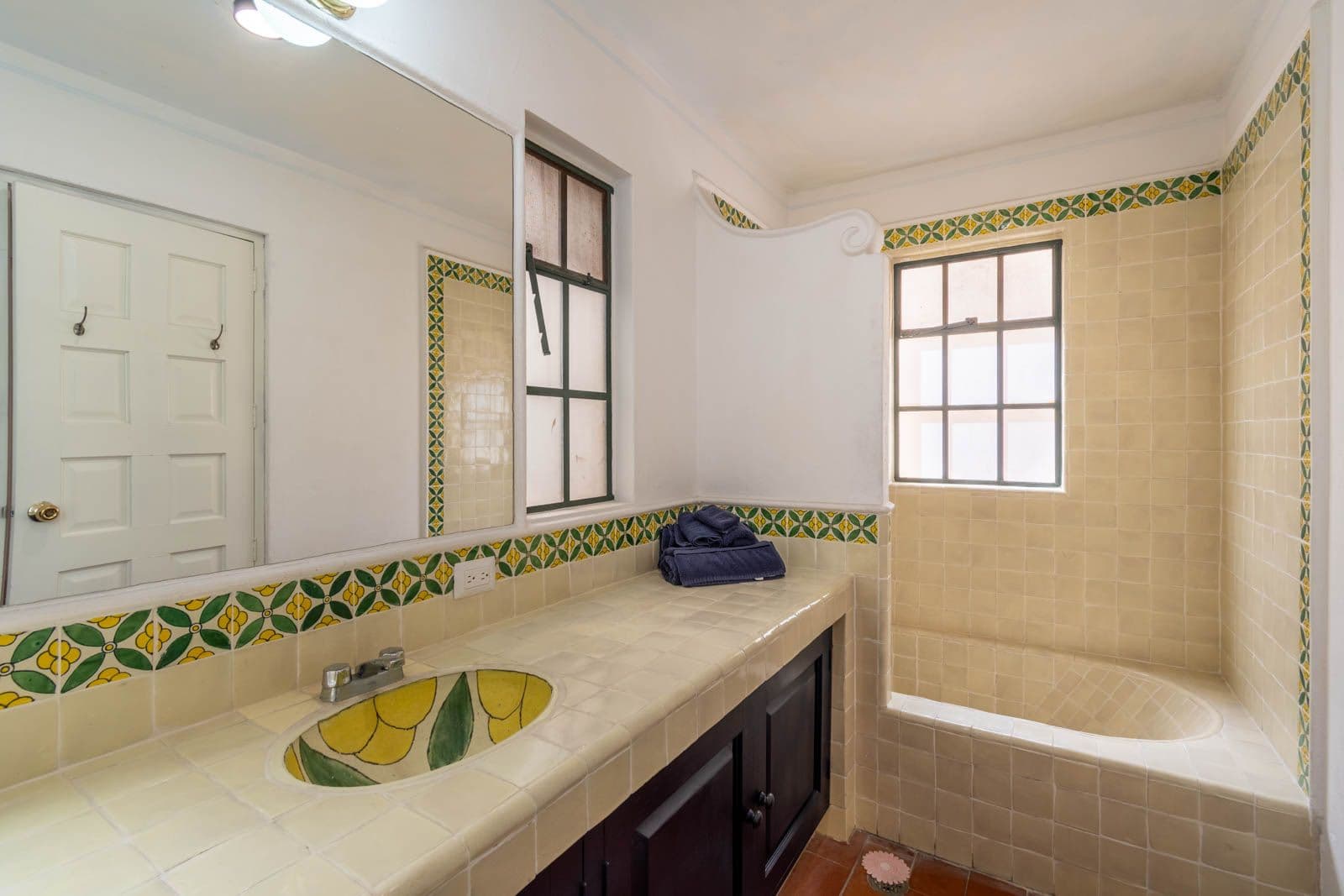 Santo Domingo Condo 9C — Centro, San Miguel de Allende — photo 15 — charming mexican tile bathroom with natural light