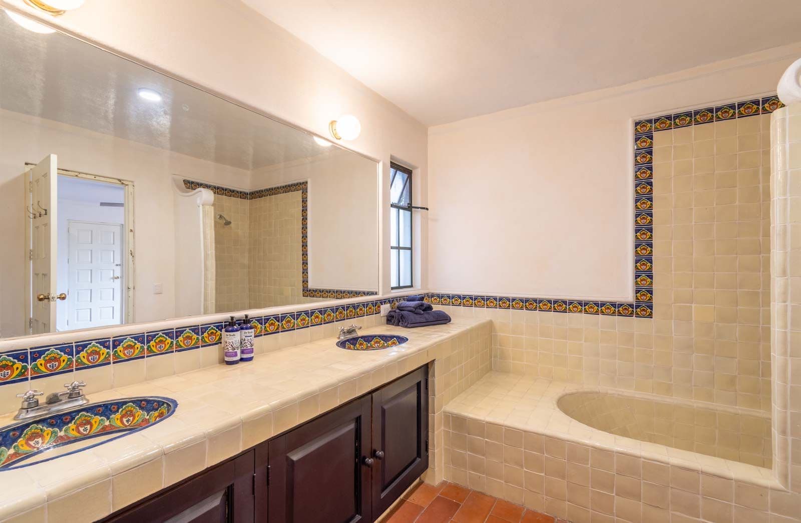 Santo Domingo Condo 9C — Centro, San Miguel de Allende — photo 9 — authentic mexican-tiled spa bathroom