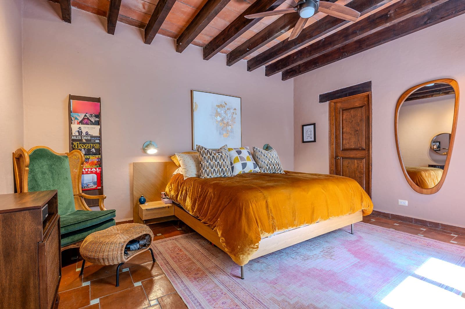 Casa Blue — La Palmita, San Miguel de Allende — photo 10 — sunlit bedroom with rustic wooden beams