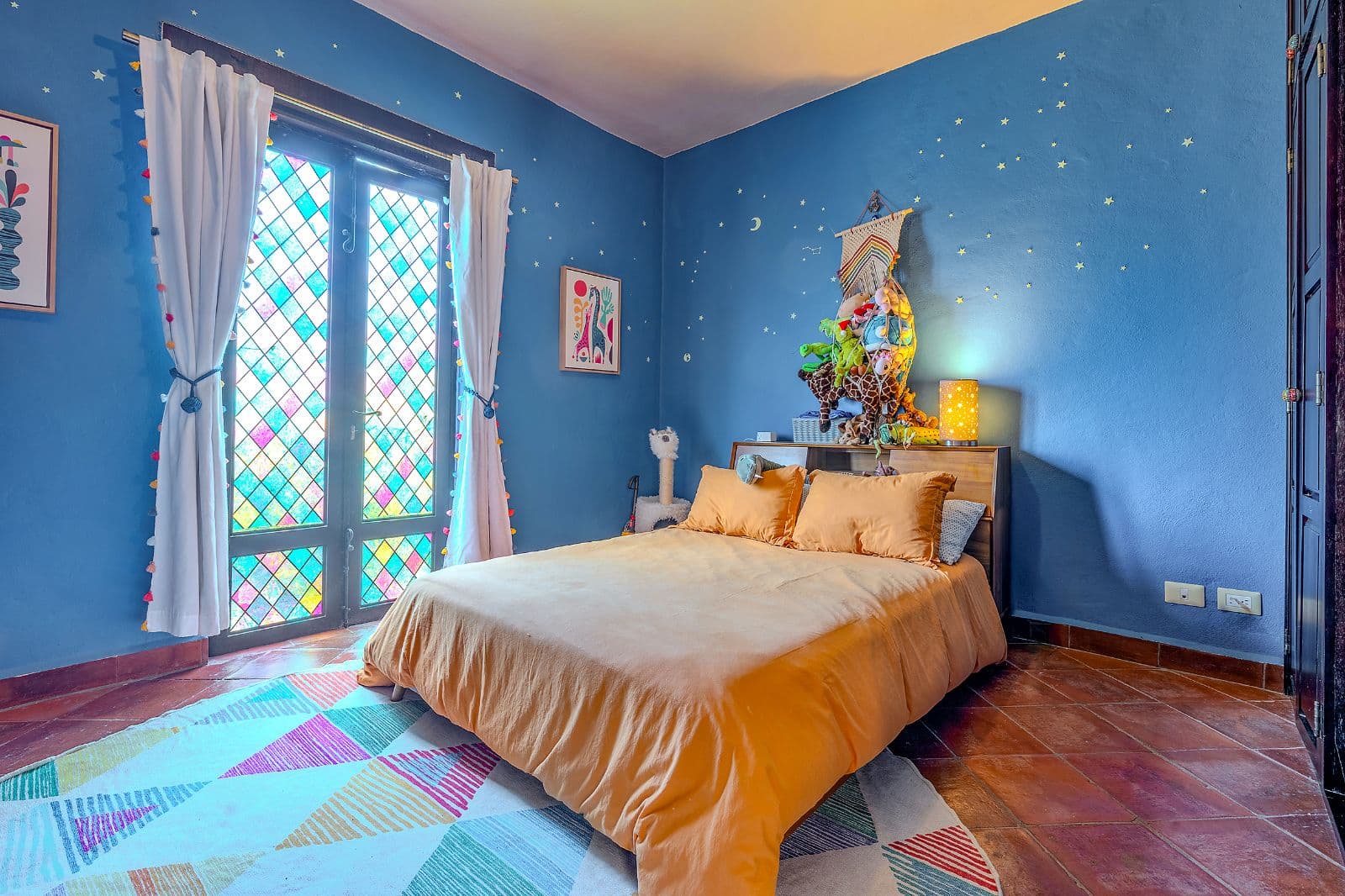 Casa Blue — La Palmita, San Miguel de Allende — photo 15 — whimsical celestial bedroom, vibrant artistry