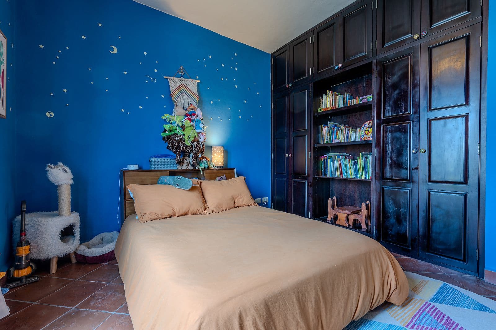 Casa Blue — La Palmita, San Miguel de Allende — photo 16 — whimsical celestial bedroom with built-in storage