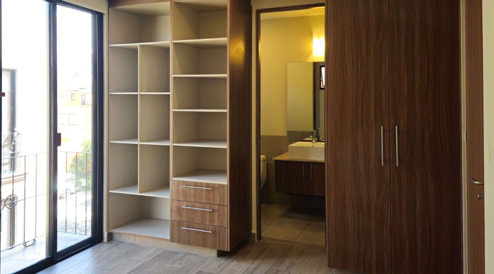 Condo Alegre — Quinta de Allende, San Miguel de Allende — photo 9 — sophisticated walk-in closet with spa-like ensuite