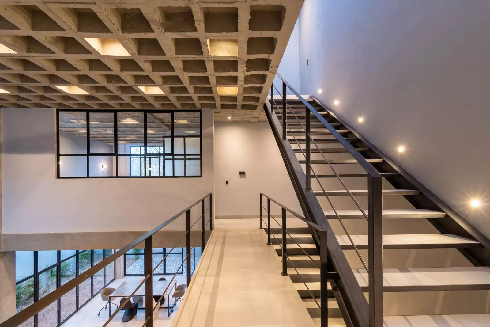 Brut House — San Antonio, San Miguel de Allende — photo 12 — contemporary mezzanine with architectural light