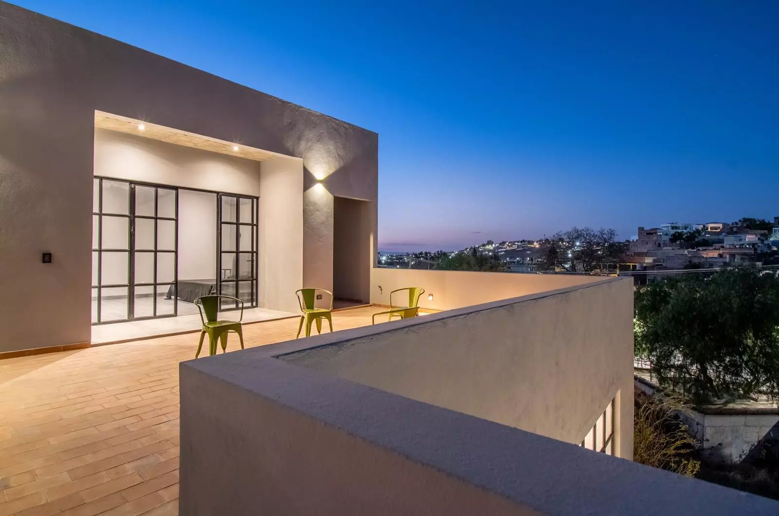 Brut House — San Antonio, San Miguel de Allende — photo 23 — twilight rooftop sanctuary, panoramic city views