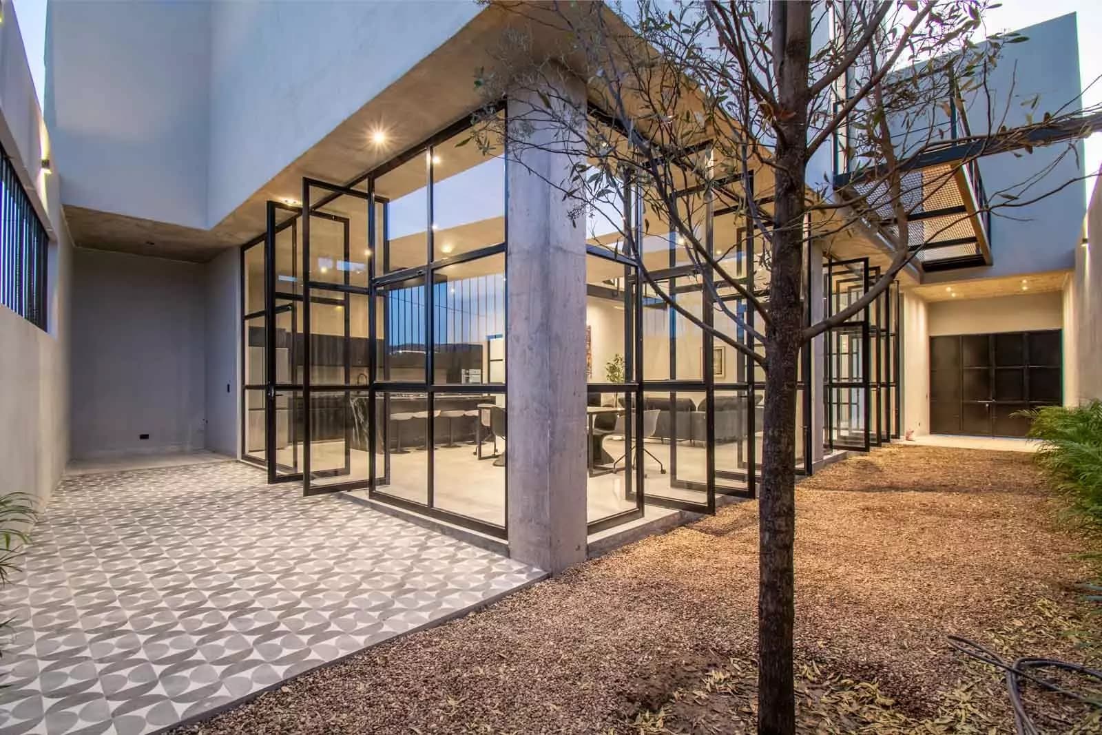 Brut House — San Antonio, San Miguel de Allende — photo 10 — contemporary courtyard with elegant glass pavilion