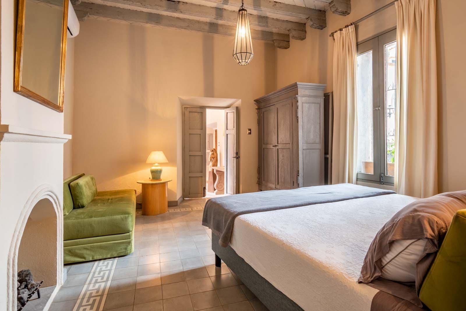 Casa Recreo — Centro, San Miguel de Allende — photo 9 — luminous master suite, rustic elegance
