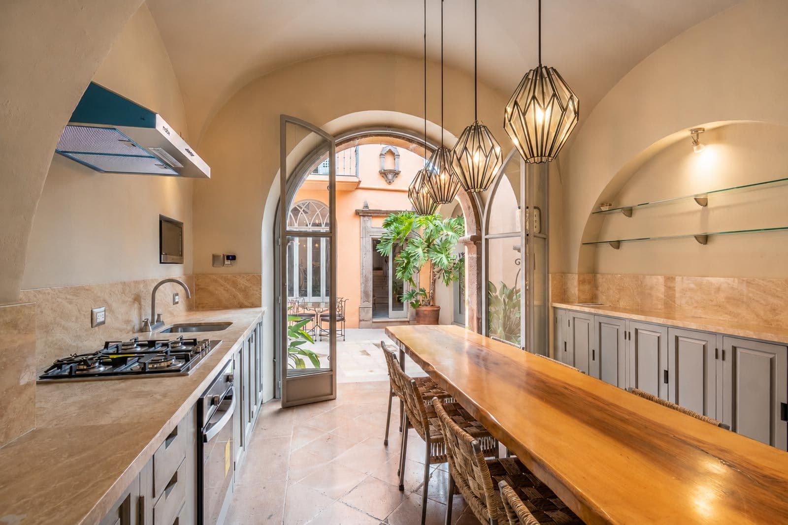 Casa Recreo — Centro, San Miguel de Allende — photo 4 — elegant colonial kitchen with courtyard views