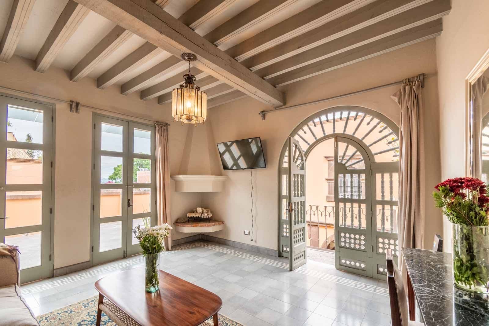 Casa Recreo — Centro, San Miguel de Allende — photo 13 — luminous colonial living with soaring beams