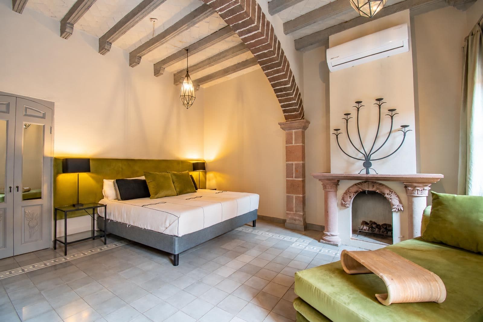 Casa Recreo — Centro, San Miguel de Allende — photo 6 — elegant colonial bedroom, soaring beamed ceilings
