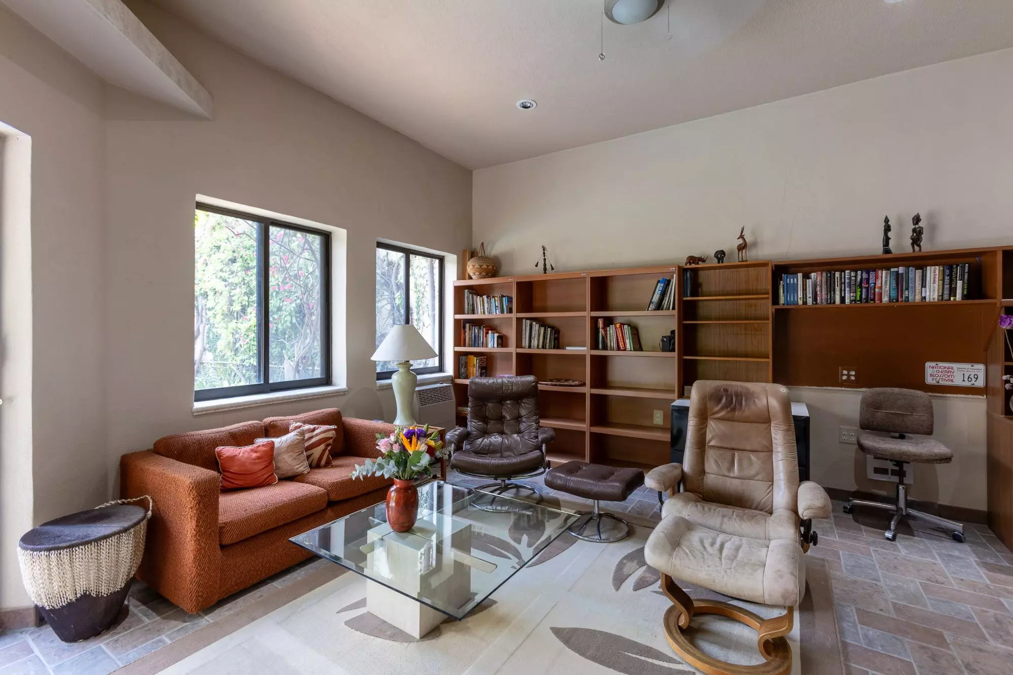 Exquisite Home in Prime San Miguel de Allende Location — Guadiana, San Miguel de Allende — photo 13 — sophisticated library lounge, sunlit elegance