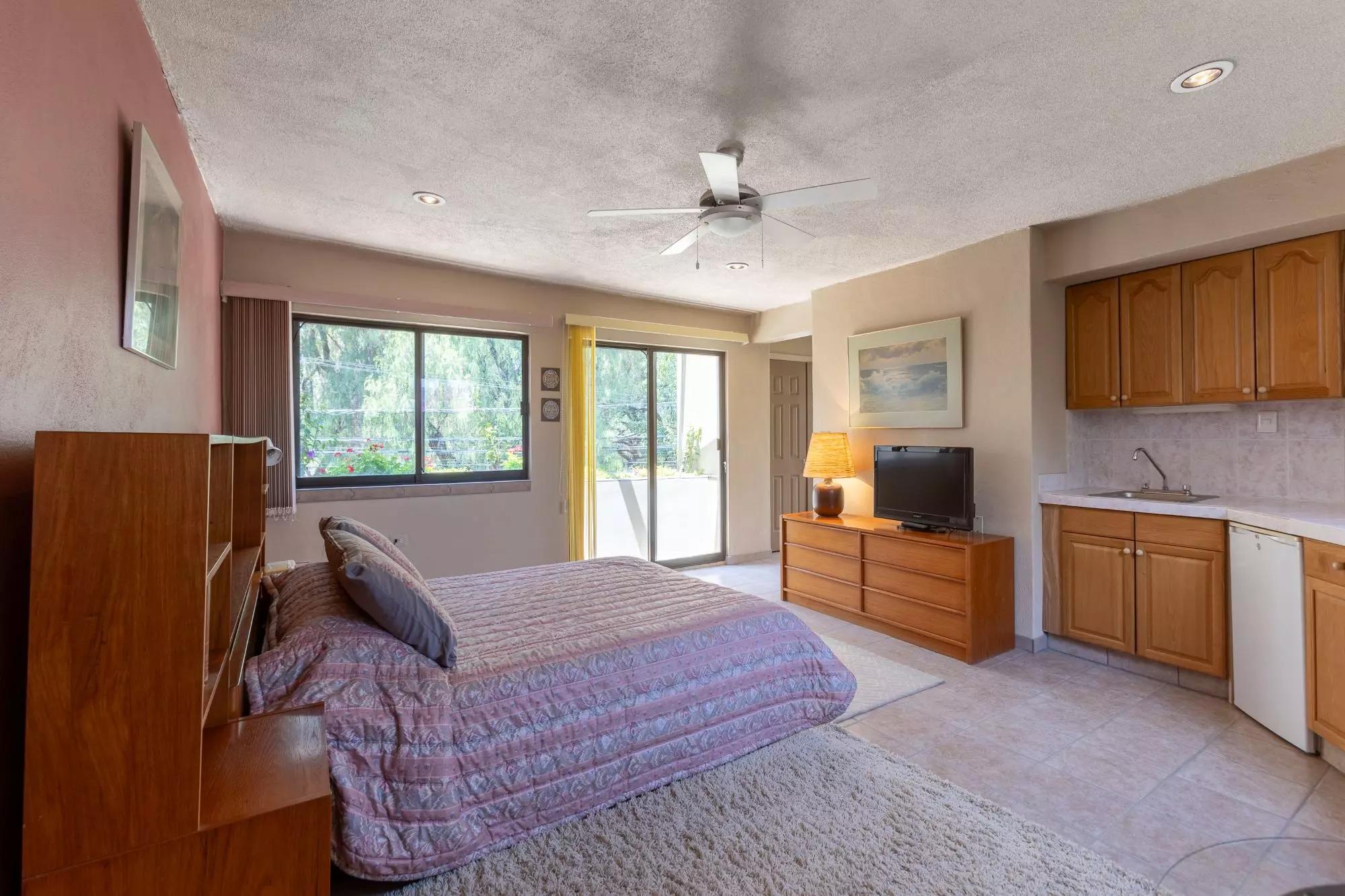 Exquisite Home in Prime San Miguel de Allende Location — Guadiana, San Miguel de Allende — photo 16 — spacious master suite with garden views