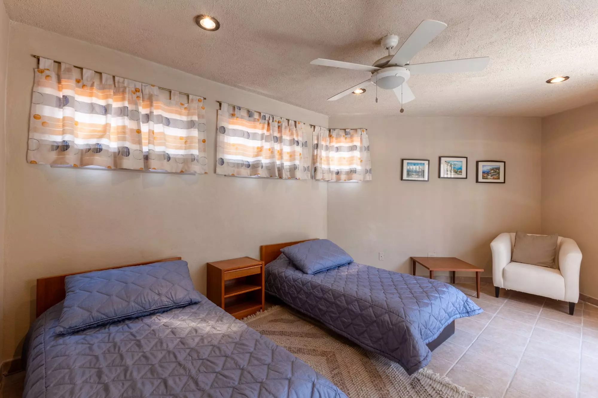 Exquisite Home in Prime San Miguel de Allende Location — Guadiana, San Miguel de Allende — photo 24 — bright guest bedroom, dual beds, serene