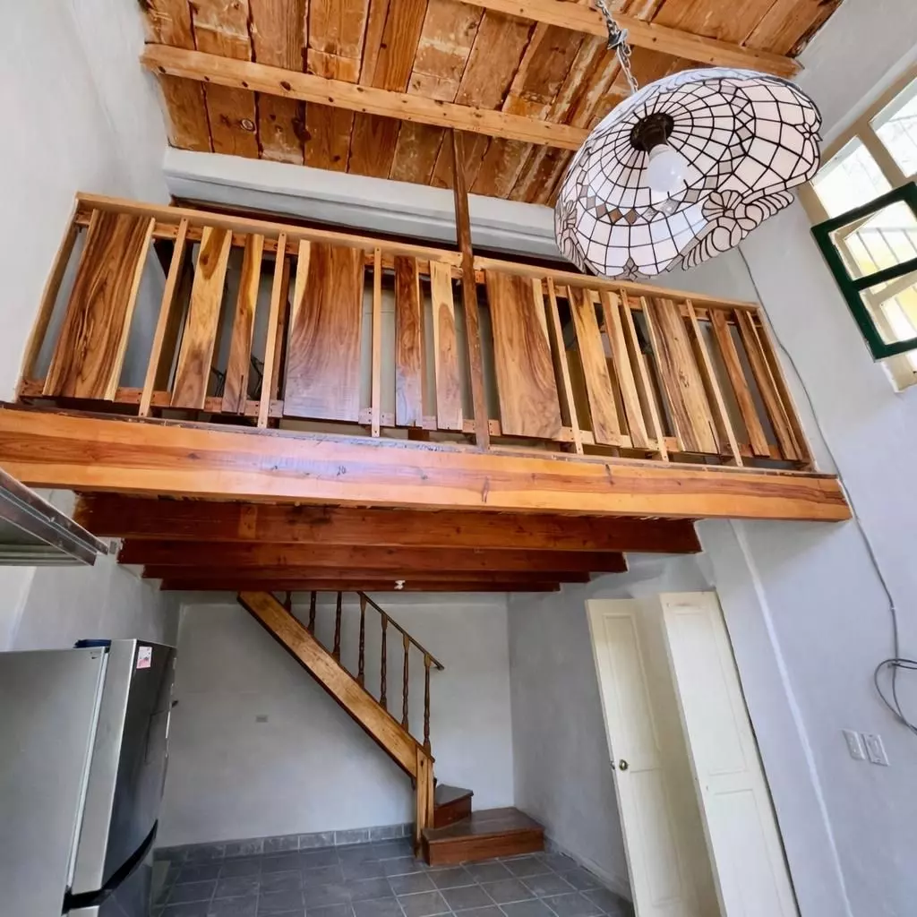 FIXER IN SAN ANTONIO — San Antonio, San Miguel de Allende — photo 9 — soaring ceilings, rustic wooden mezzanine