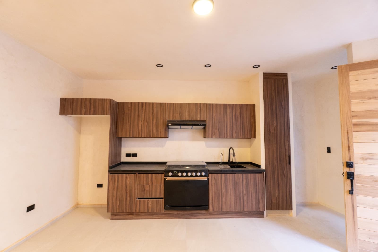 Nuñez Lofts / Loft 2 — Centro, San Miguel de Allende — photo 5 — contemporary kitchen with warm ambiance