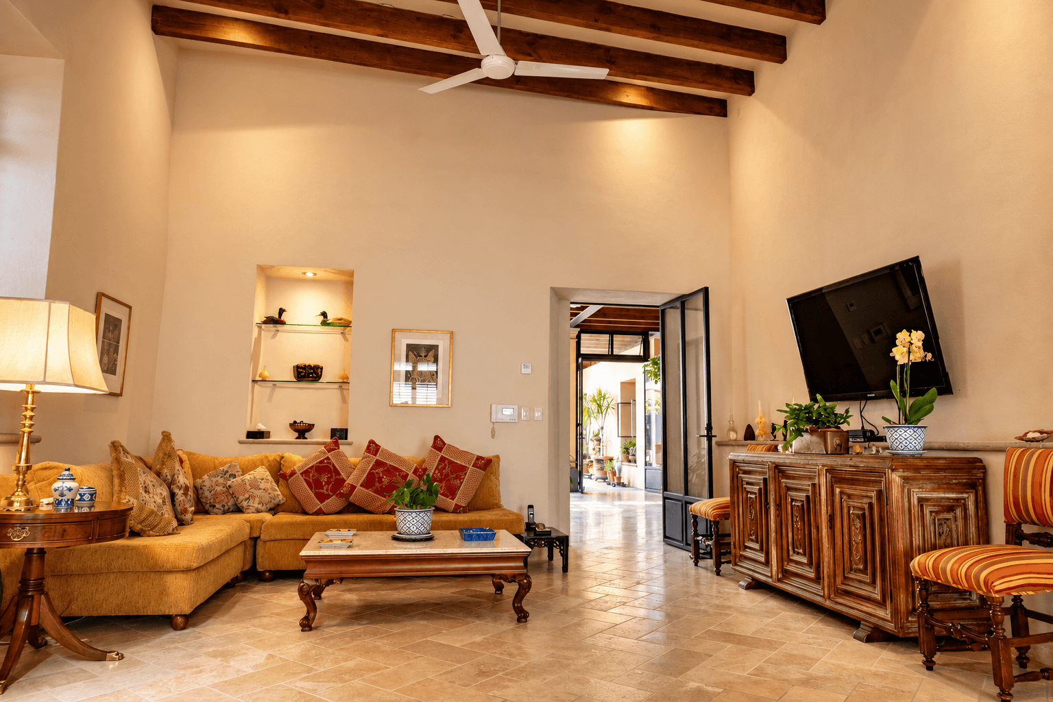 Casa Colibri — Centro, San Miguel de Allende — photo 15 — elegant living with soaring beamed ceilings