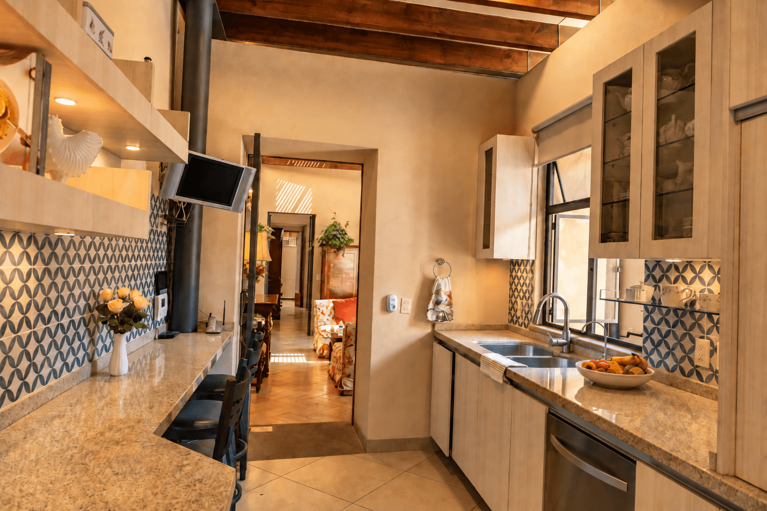 Casa Colibri — Centro, San Miguel de Allende — photo 12 — sophisticated galley kitchen, warm natural light