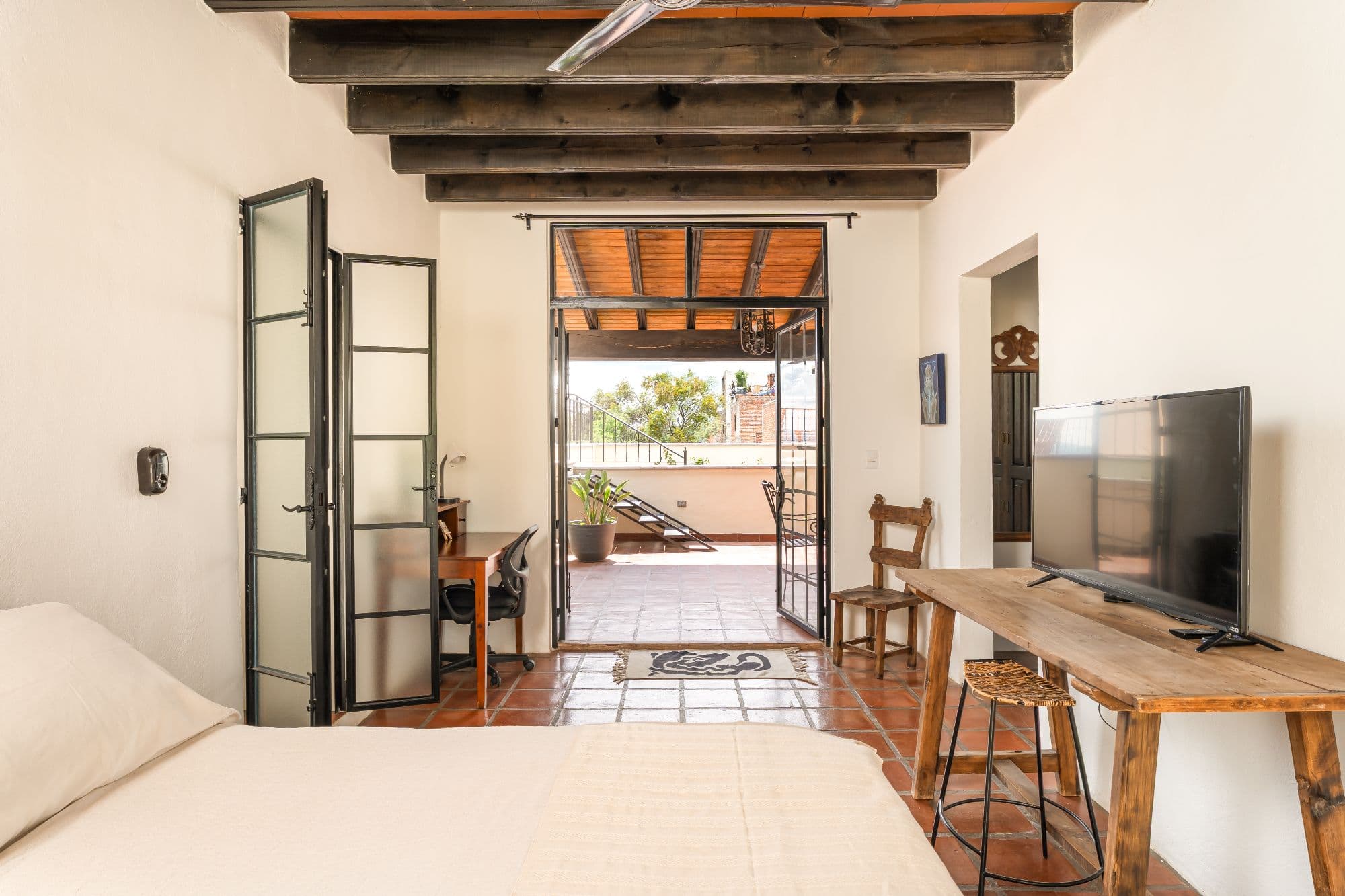 Casa Sombremesa — Las Brisas, San Miguel de Allende — photo 19 — soaring beams, radiant terrace access
