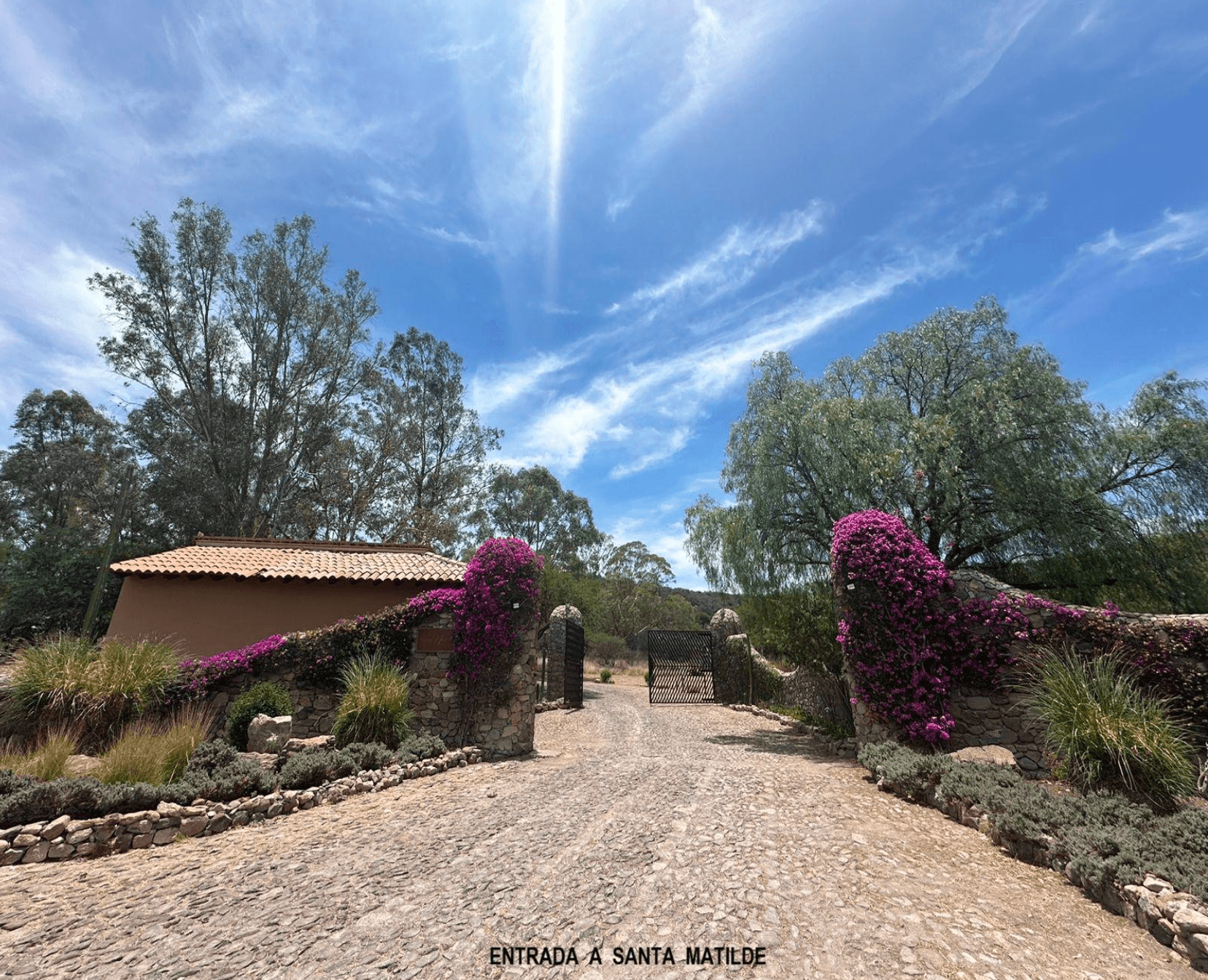 Santa Matilde Valley View — San Miguel de Allende Centro, San Miguel de Allende — photo 2 — enchanting hacienda entrance, vibrant bougainvillea charm