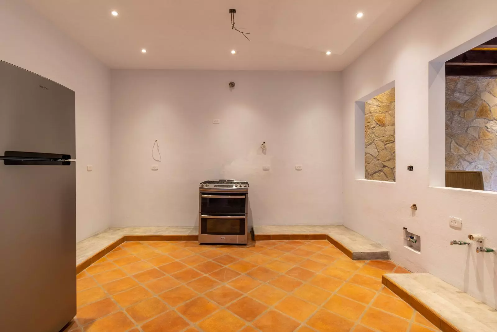 Villa Tamayo — Guadiana, San Miguel de Allende — photo 12 — rustic terracotta kitchen with authentic character