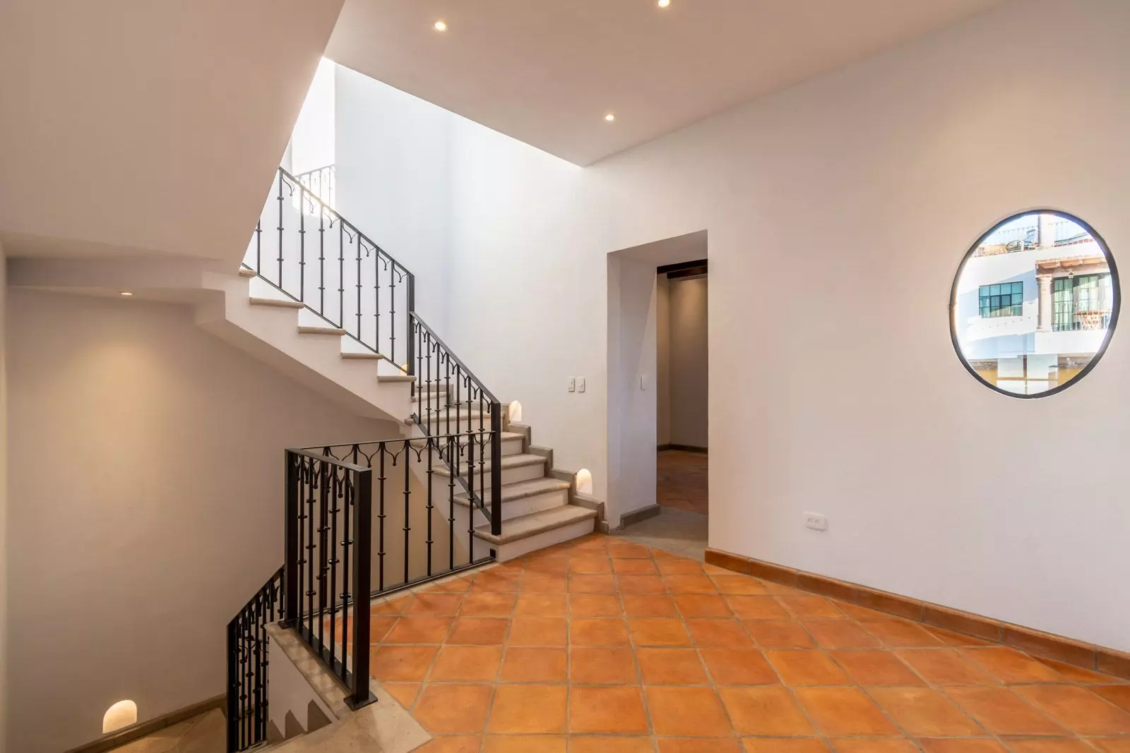 Villa Tamayo — Guadiana, San Miguel de Allende — photo 14 — sophisticated double-height foyer with skylight