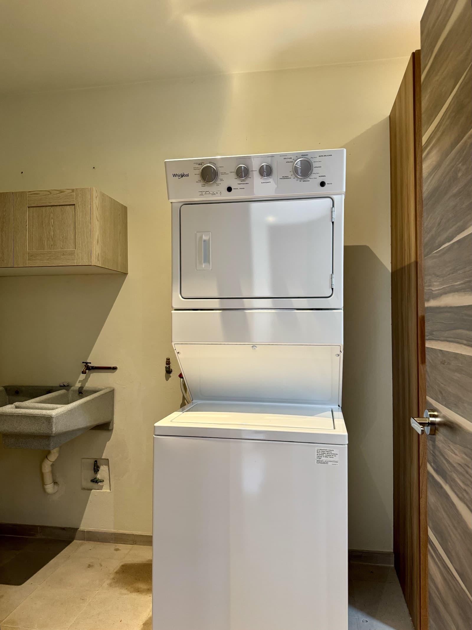 Quinta Tenerías (Units 2, 4 & 5) — Centro, San Miguel de Allende — photo 23 — bright laundry room, practical elegance