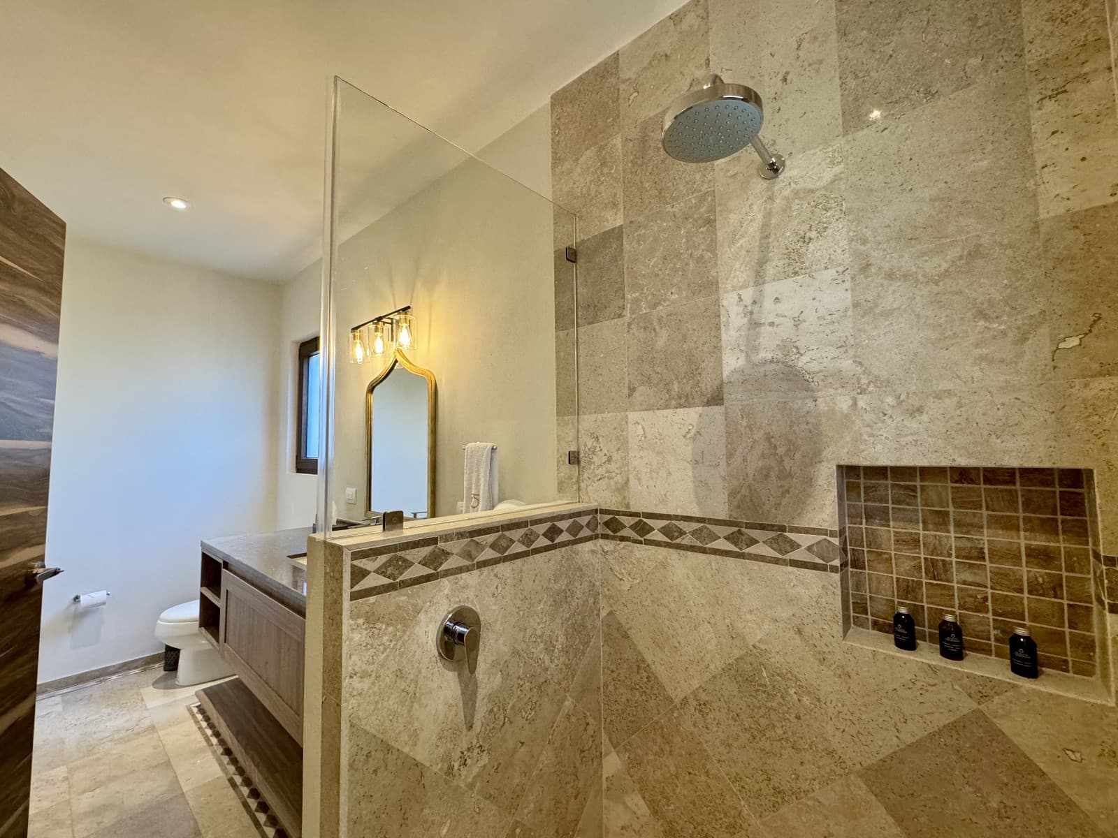 Quinta Tenerías (Units 2, 4 & 5) — Centro, San Miguel de Allende — photo 19 — spa-inspired travertine shower sanctuary