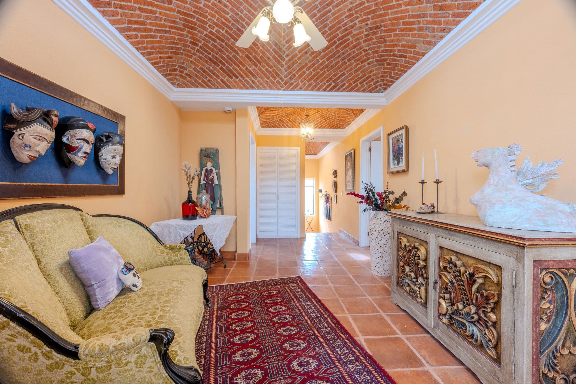 Casa De Las Máscaras — Atascadero (Arcos de San Miguel), San Miguel de Allende — photo 18 — sunlit colonial gallery with authentic charm