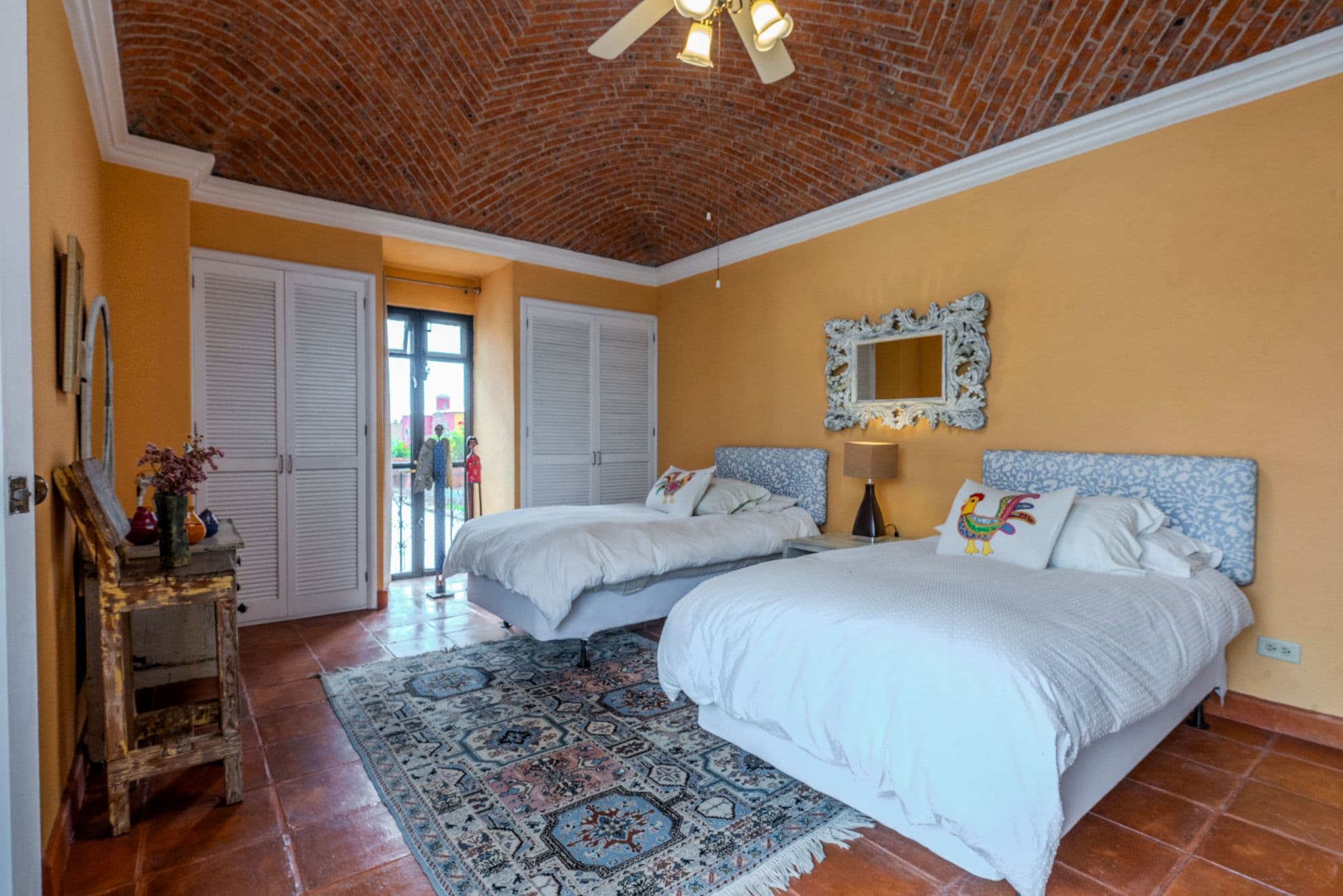 Casa De Las Máscaras — Atascadero (Arcos de San Miguel), San Miguel de Allende — photo 27 — sunlit guest bedroom, colonial charm elegance
