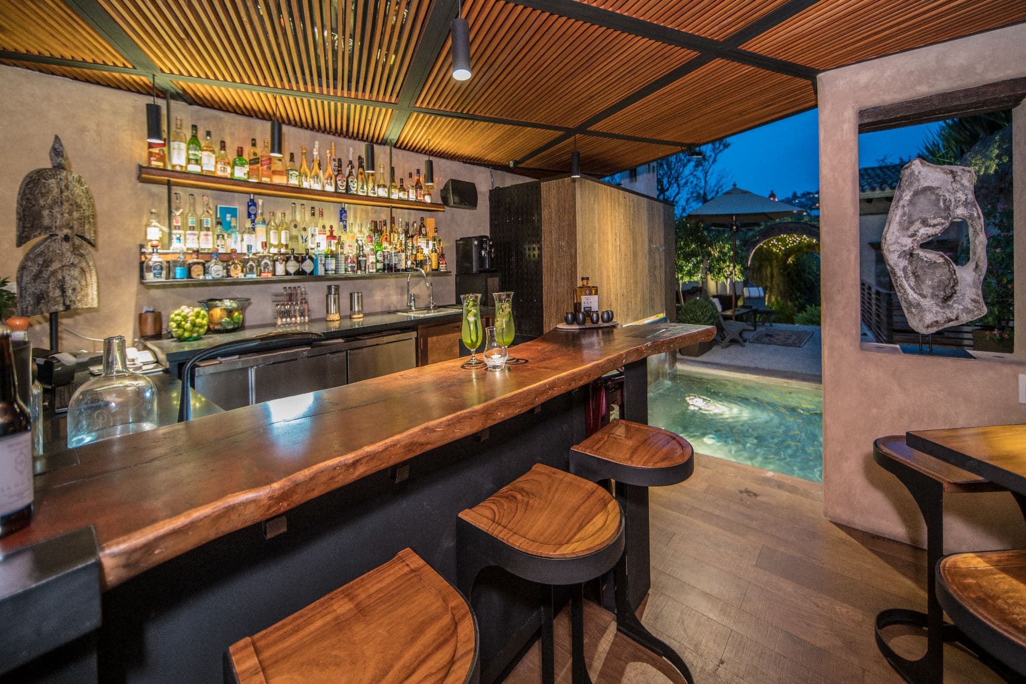 Casa No Name — Centro, San Miguel de Allende — photo 32 — sophisticated poolside bar, ambient lighting elegance