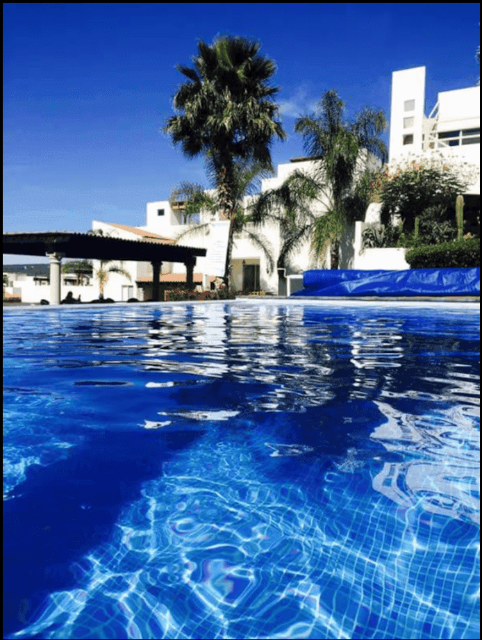 Casa Garzas — Las Brisas, San Miguel de Allende — photo 4 — sparkling resort-style poolside elegance