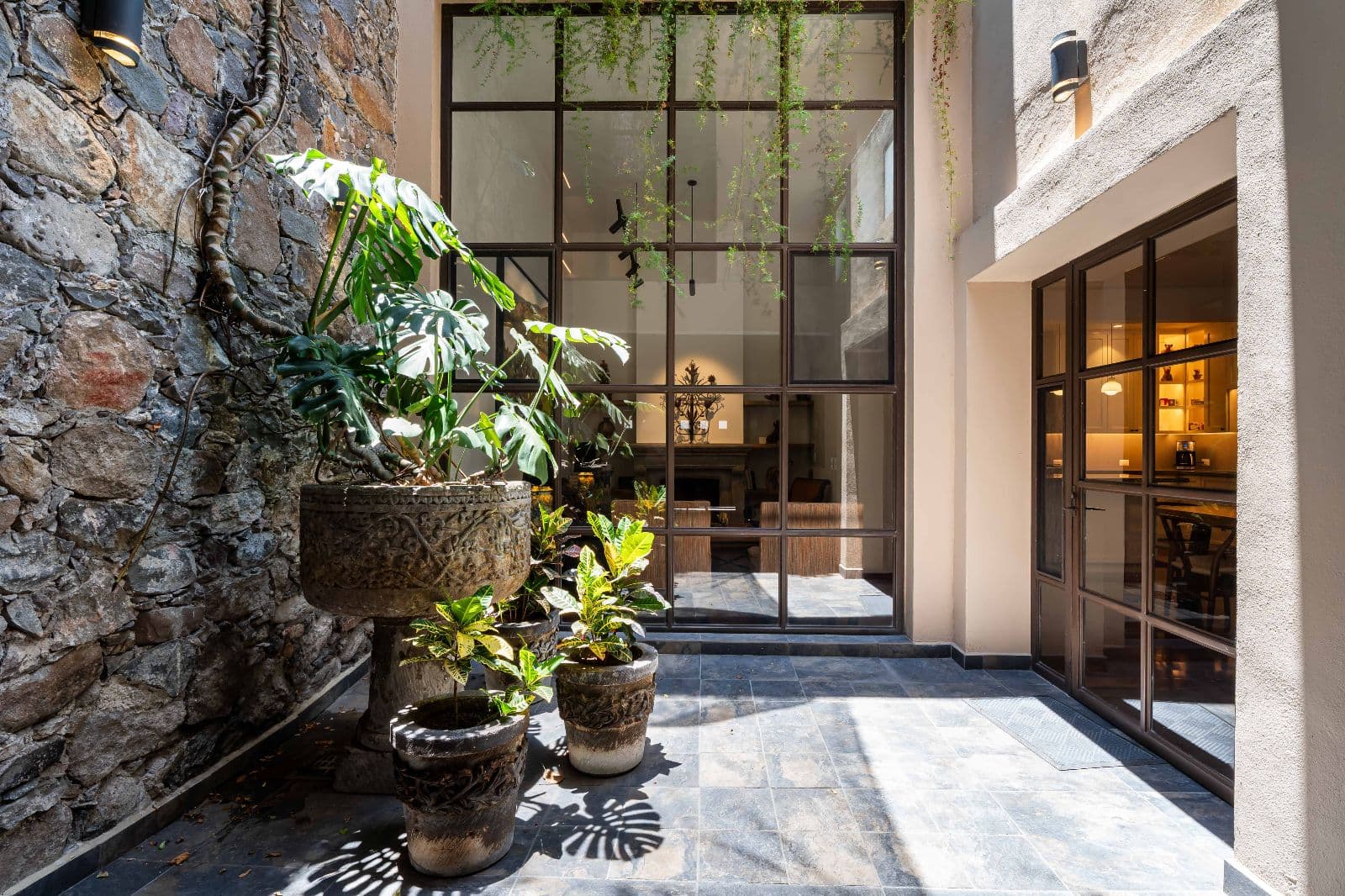 Casa 28 — Centro, San Miguel de Allende — photo 5 — sunlit courtyard blends historic charm elegantly