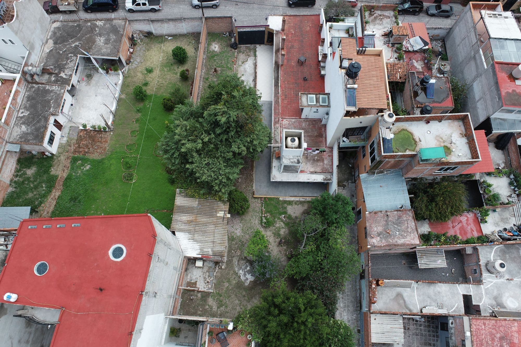 San Antonio Investment Lot — San Antonio, San Miguel de Allende — photo 8 — lush grounds, vibrant rooftop potential