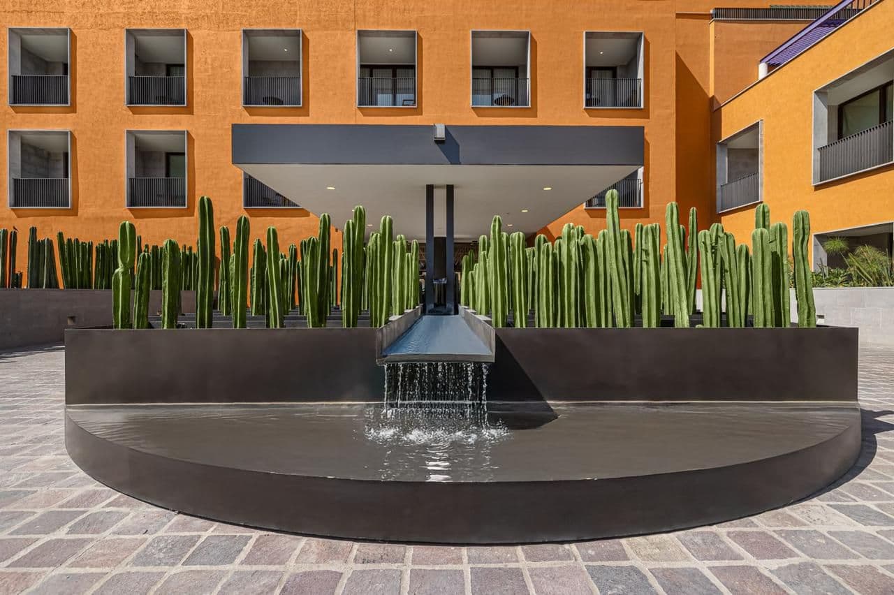 Clevia Apartment — Centro, San Miguel de Allende — photo 10 — contemporary courtyard with serene water feature