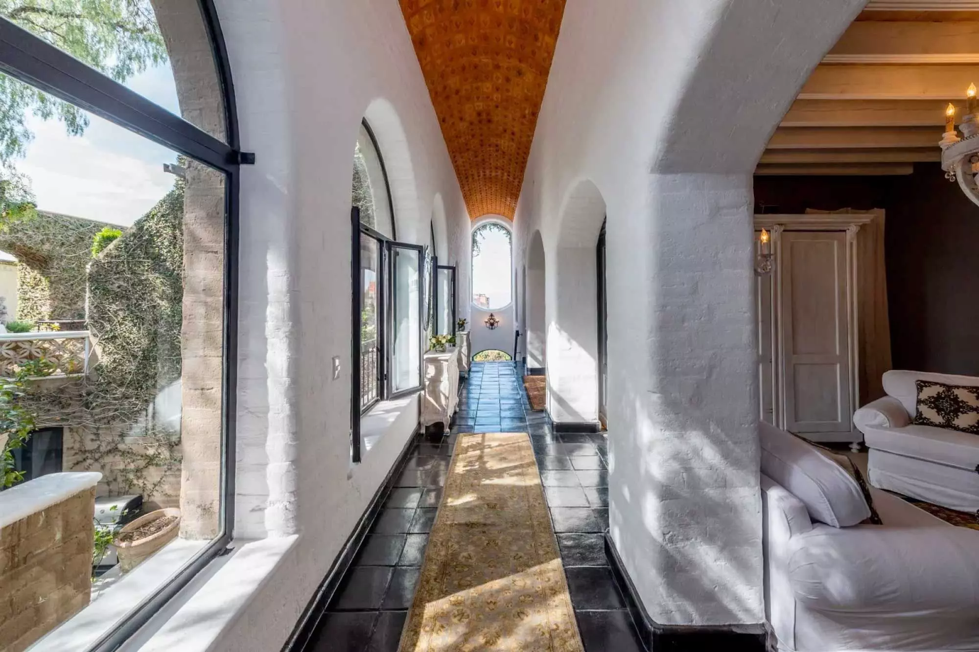 Casa Mi Besito — Atascadero (Arcos de San Miguel), San Miguel de Allende — photo 14 — luminous arched gallery, soaring brick ceiling