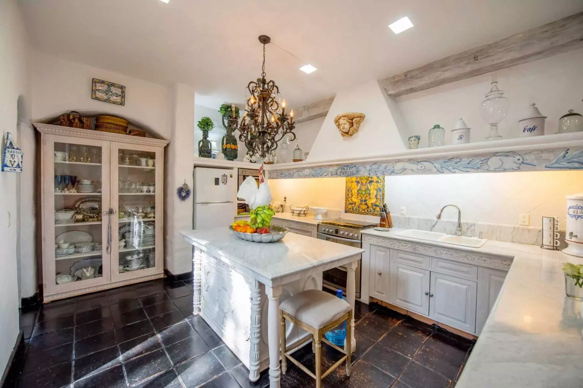 Casa Mi Besito — Atascadero (Arcos de San Miguel), San Miguel de Allende — photo 8 — elegant traditional kitchen, abundant natural light