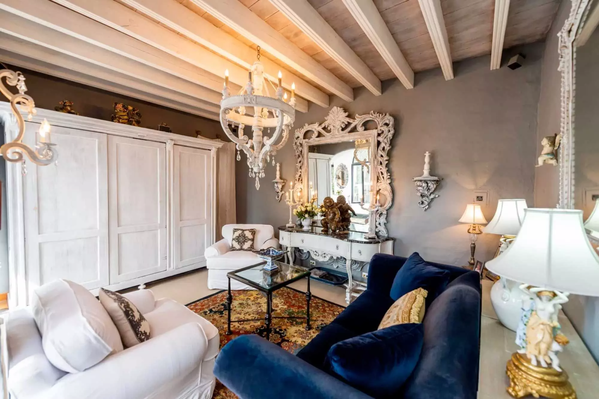 Casa Mi Besito — Atascadero (Arcos de San Miguel), San Miguel de Allende — photo 10 — elegant salon with soaring beamed ceilings