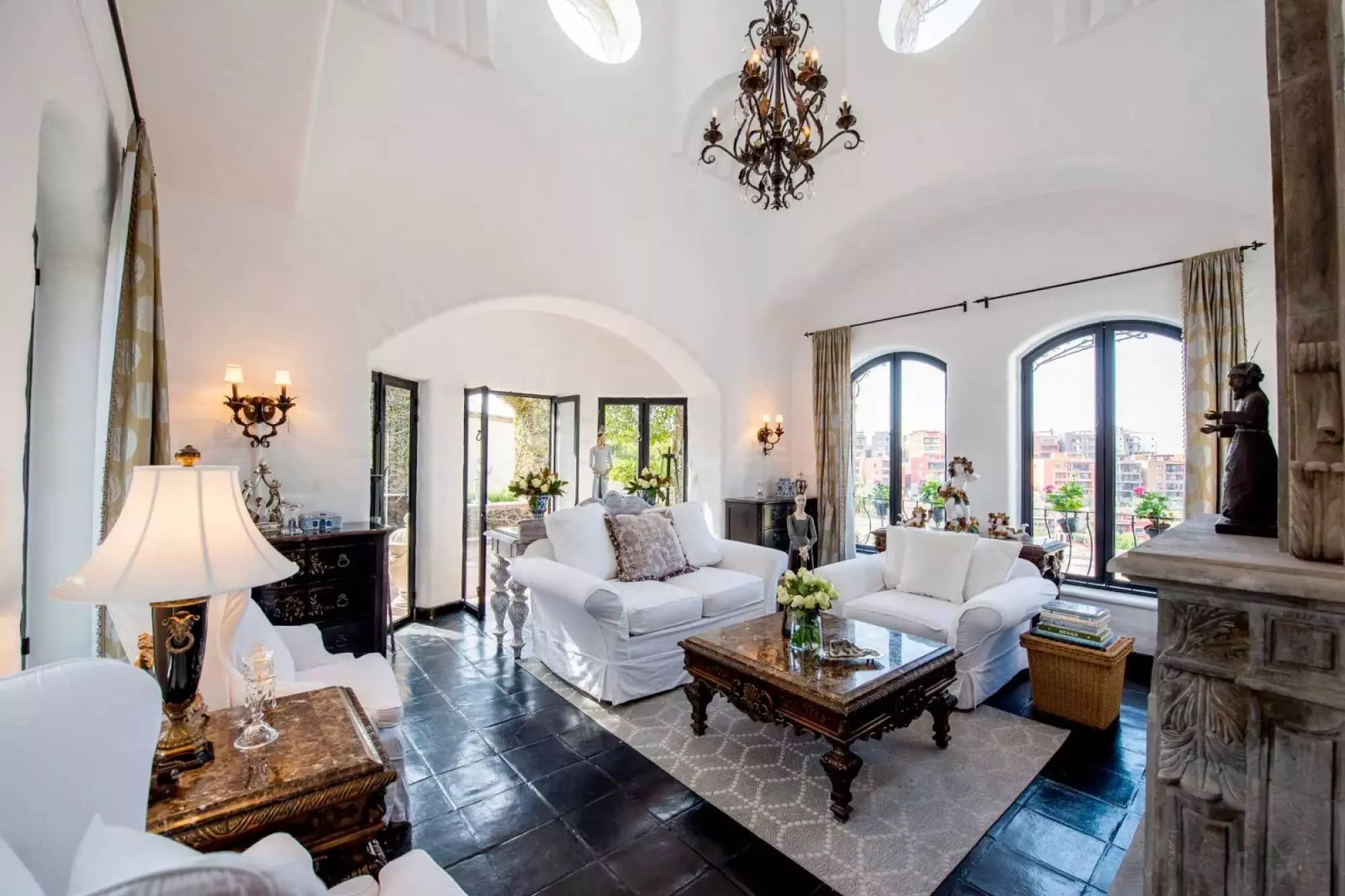 Casa Mi Besito — Atascadero (Arcos de San Miguel), San Miguel de Allende — photo 5 — elegant arched living with panoramic city views