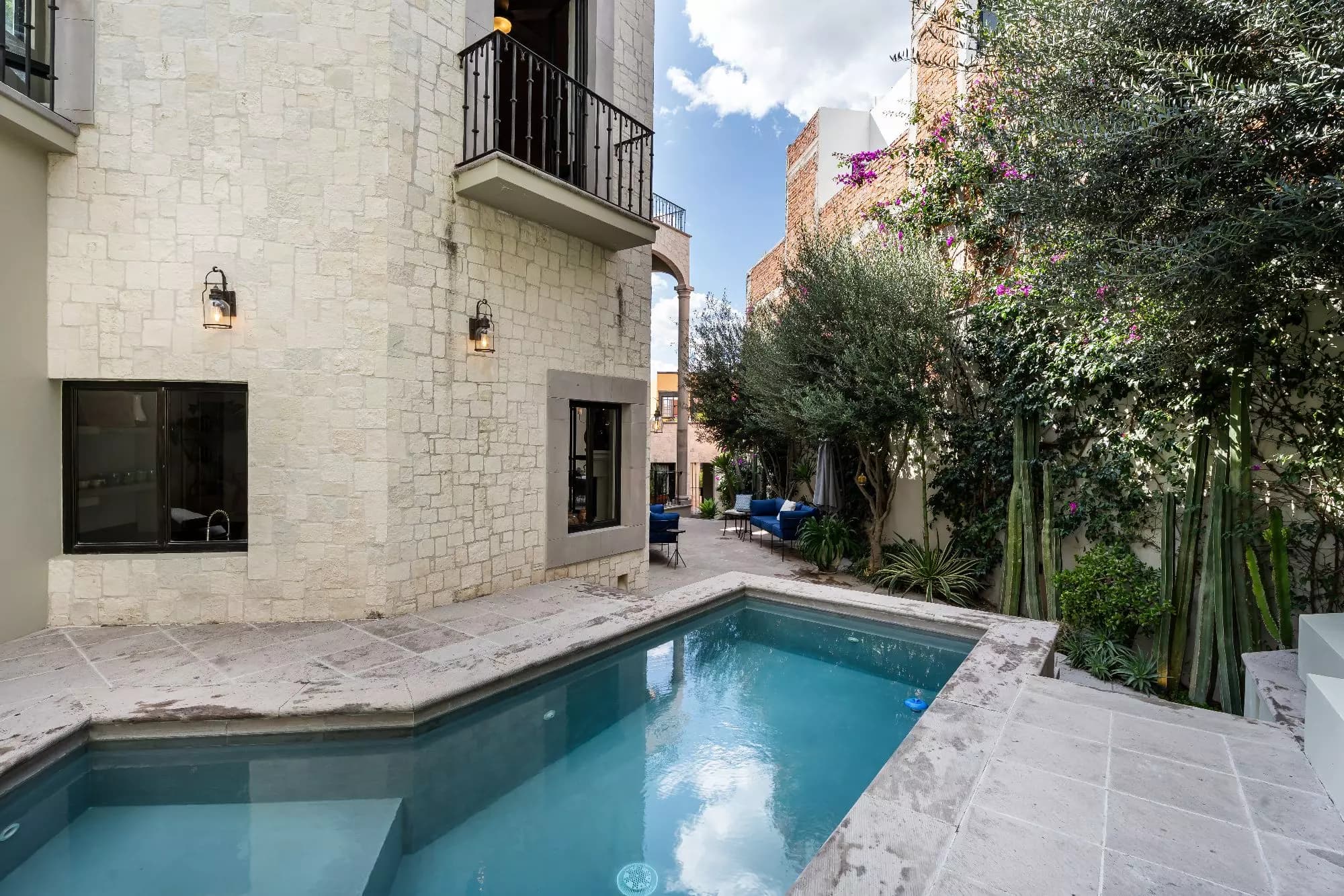 Casa Dos Casas — Guadiana, San Miguel de Allende — photo 24 — serene courtyard pool, colonial elegance