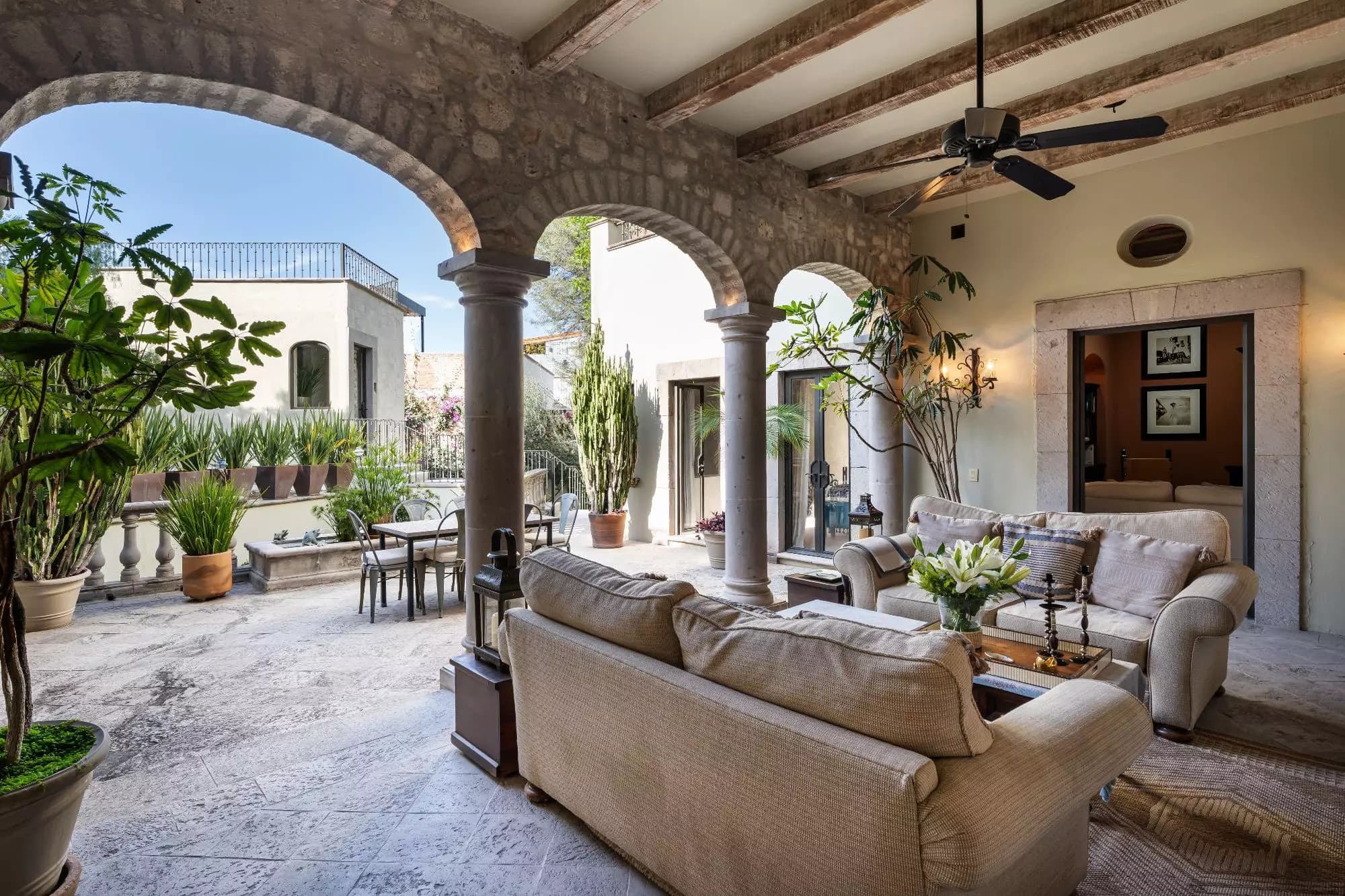 Casa Dos Casas — Guadiana, San Miguel de Allende — photo 10 — elegant colonial courtyard with arched colonnades