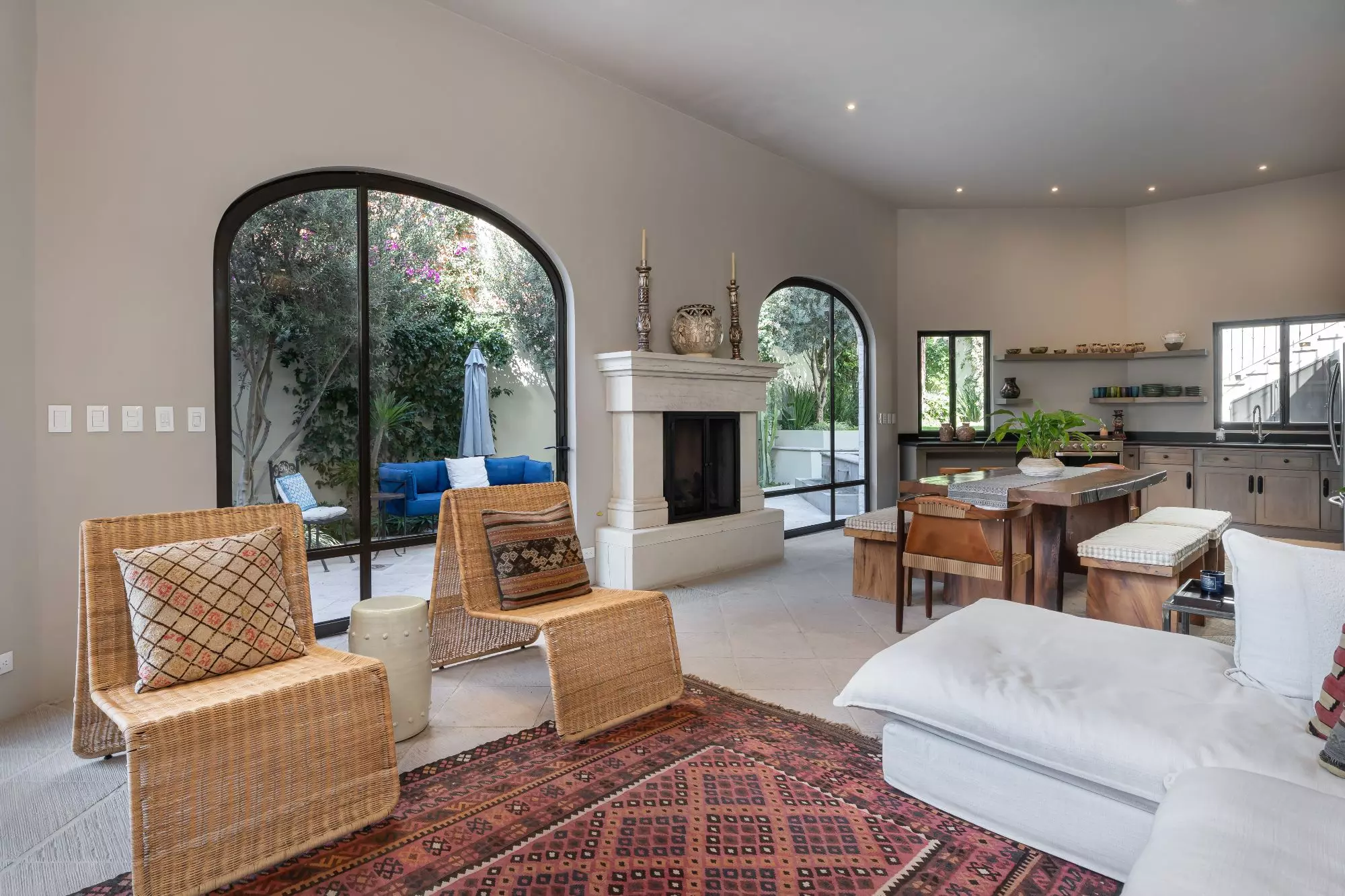 Casa Dos Casas — Guadiana, San Miguel de Allende — photo 27 — sophisticated open-plan living with garden views