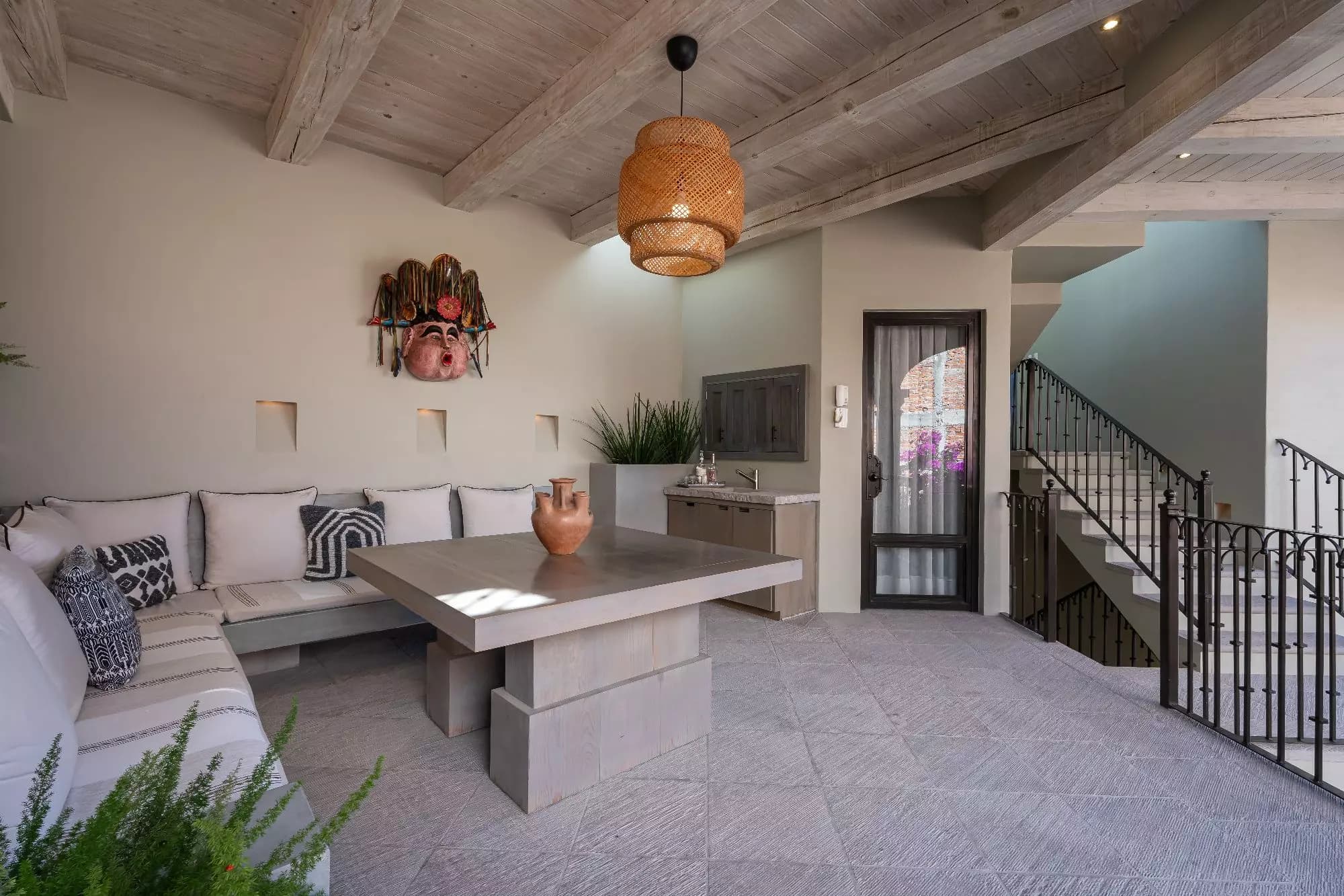 Casa Dos Casas — Guadiana, San Miguel de Allende — photo 38 — serene courtyard with rustic wooden beams