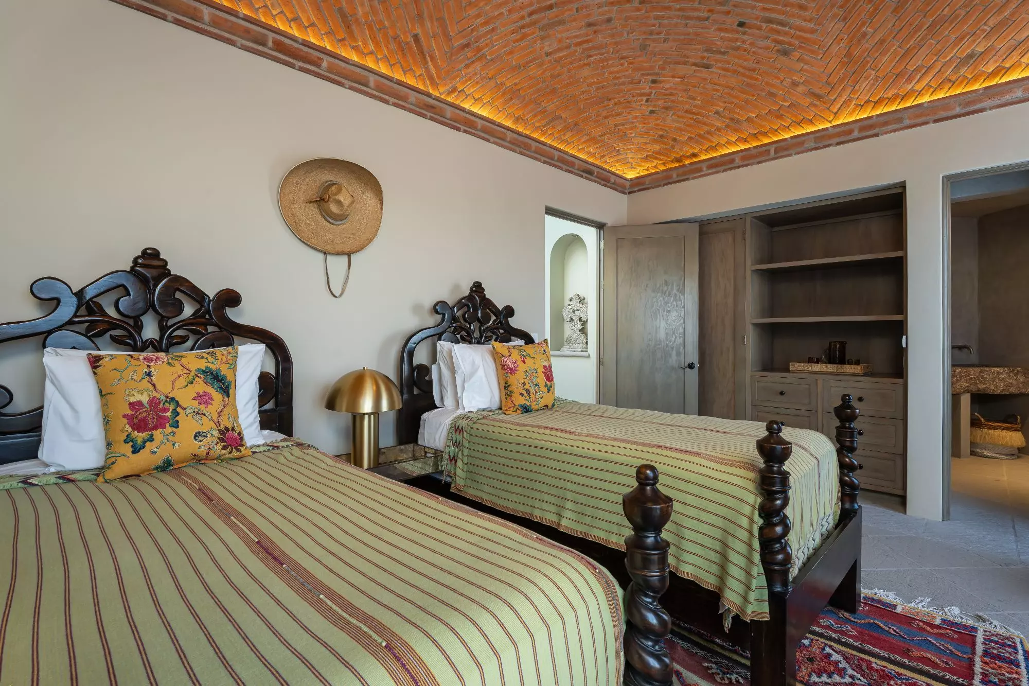 Casa Dos Casas — Guadiana, San Miguel de Allende — photo 41 — charming colonial bedroom, warm ambient lighting