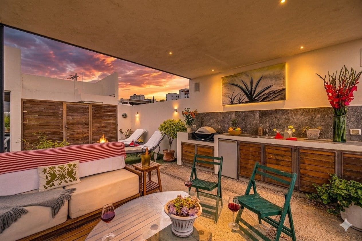 Casa Paraíso — El Paraiso, San Miguel de Allende — photo 24 — sunset-lit rooftop entertaining oasis