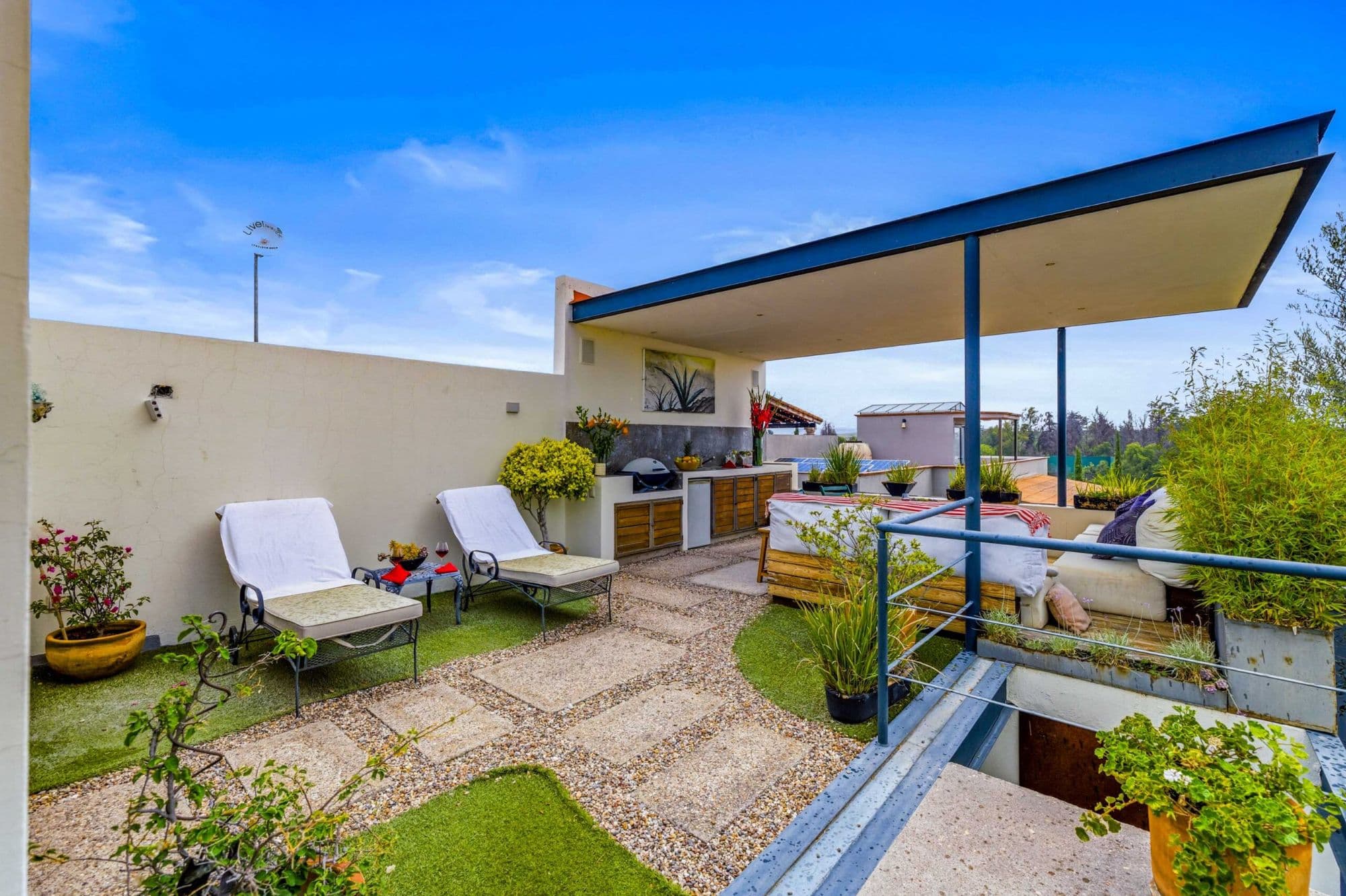 Casa Paraíso — El Paraiso, San Miguel de Allende — photo 17 — sophisticated rooftop terrace, seamless indoor-outdoor living
